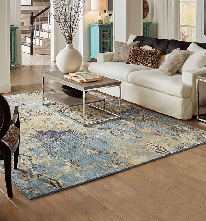 Area rug in living room | Emo Flooring company